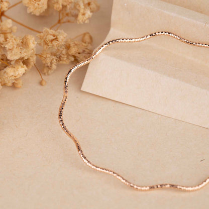 Sleek Wavy Rose Gold Bracelet